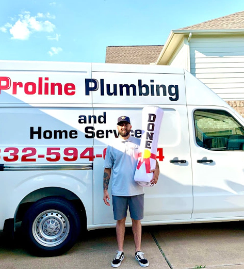 worker on front of a white van with the proline logo